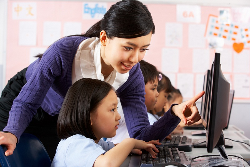 Teacher and student doing Test Paper